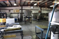 Busy distillery floor.