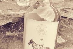 E.M. Walton's Corn Whiskey on rocks